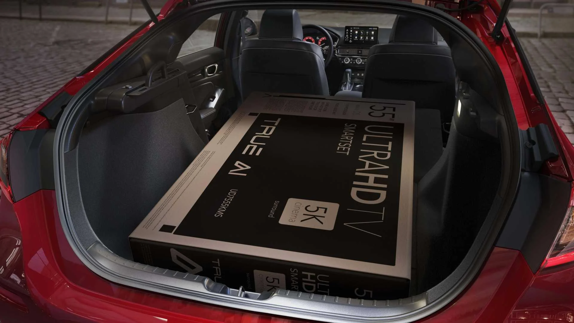 Shot of a TV in the trunk of a 2025 Honda Civic Hatchback