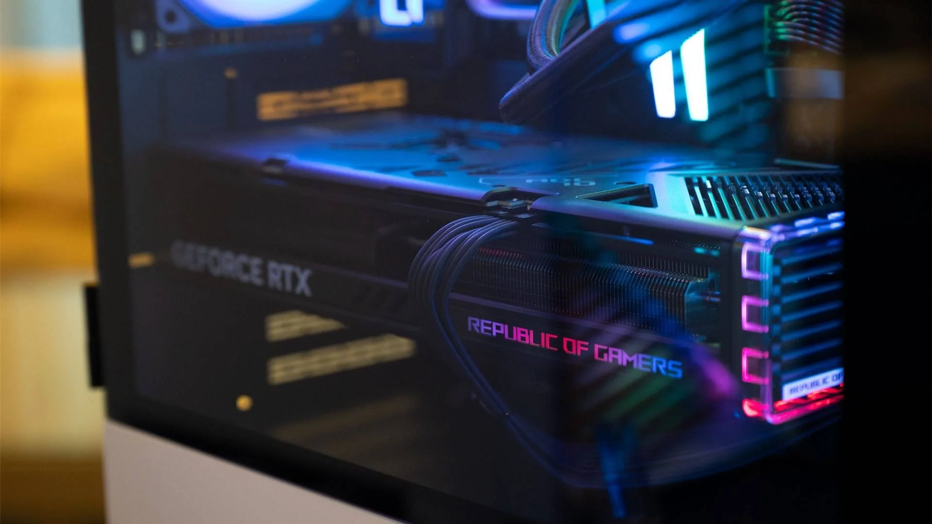 ASUS Republic of Gamers NVIDIA GeForce RTX GPU inside a gaming PC.