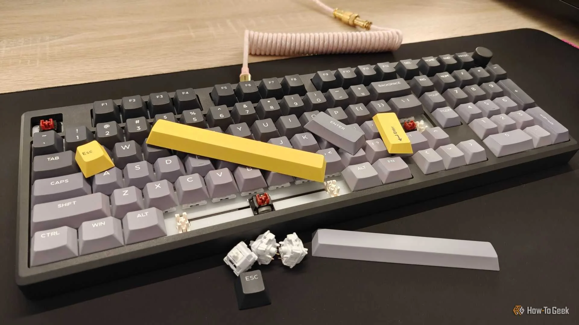 The EPOMAKER Galaxy100 Lite mechanical keyboard with a few custom keycaps and switches.
