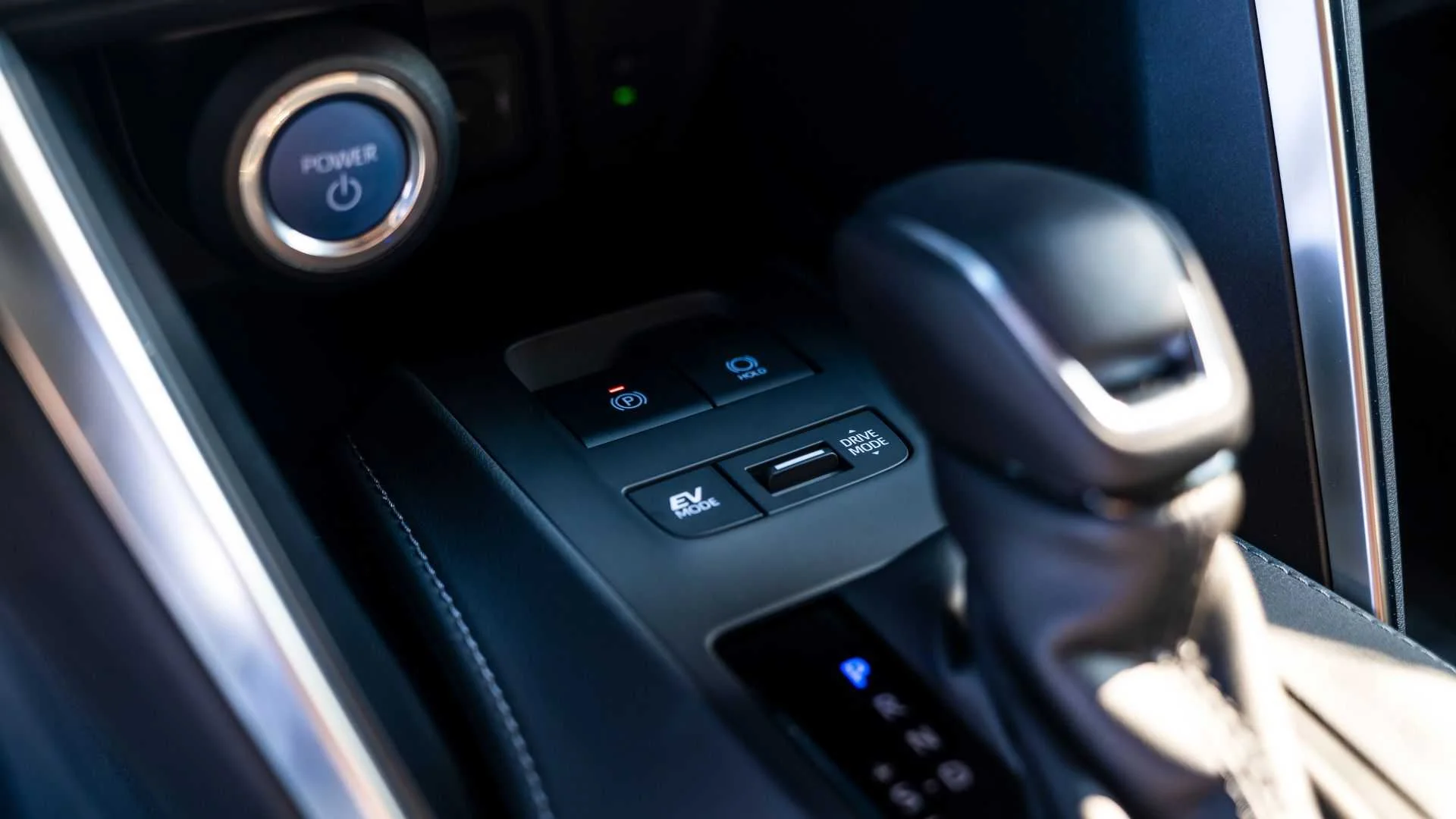 Close-up shot of the gear selector in a 2022 Toyota Venza LE.