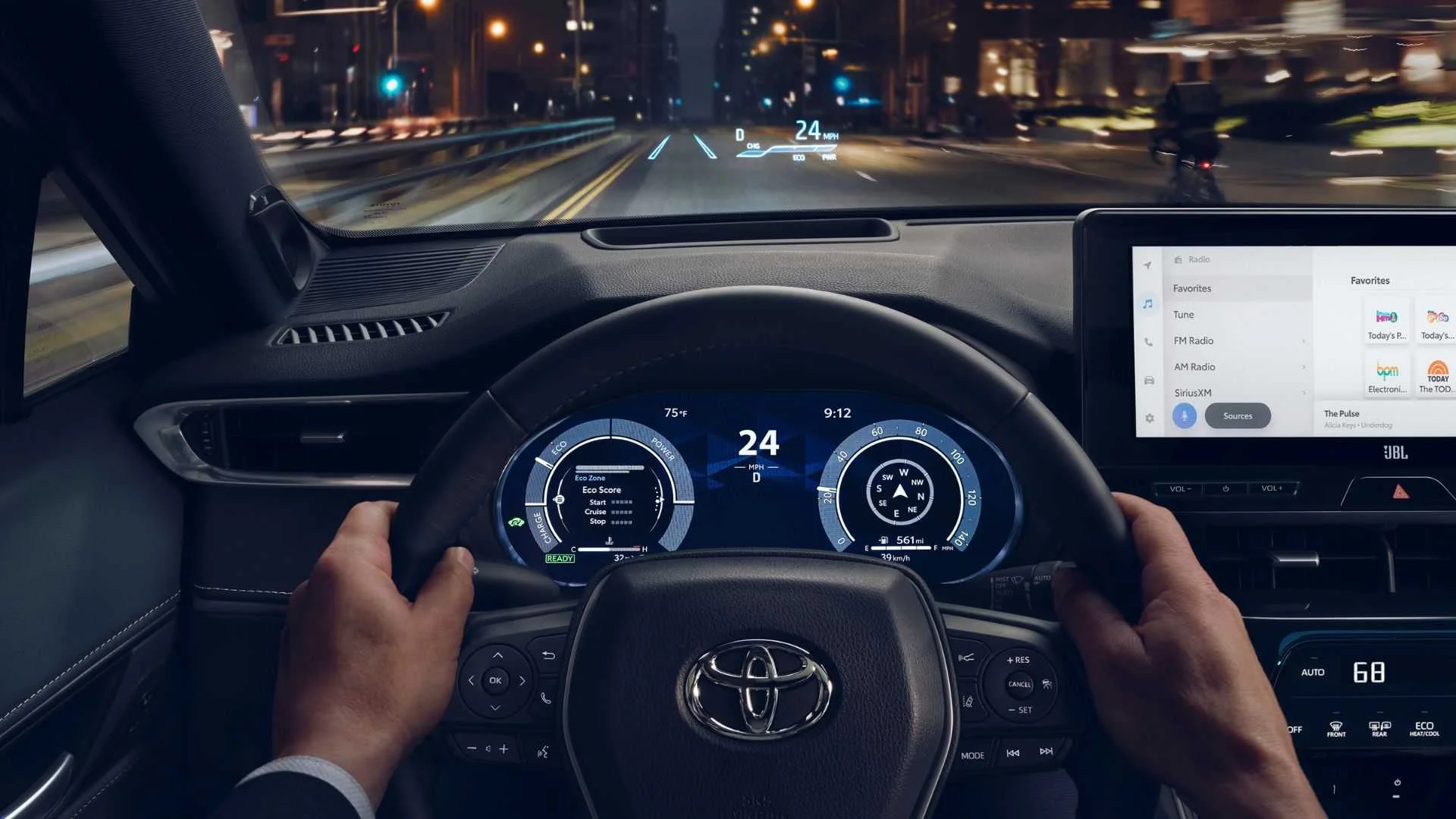 Shot of a man behind the wheel of a 2024 Toyota Venza Limited and the head-up display.