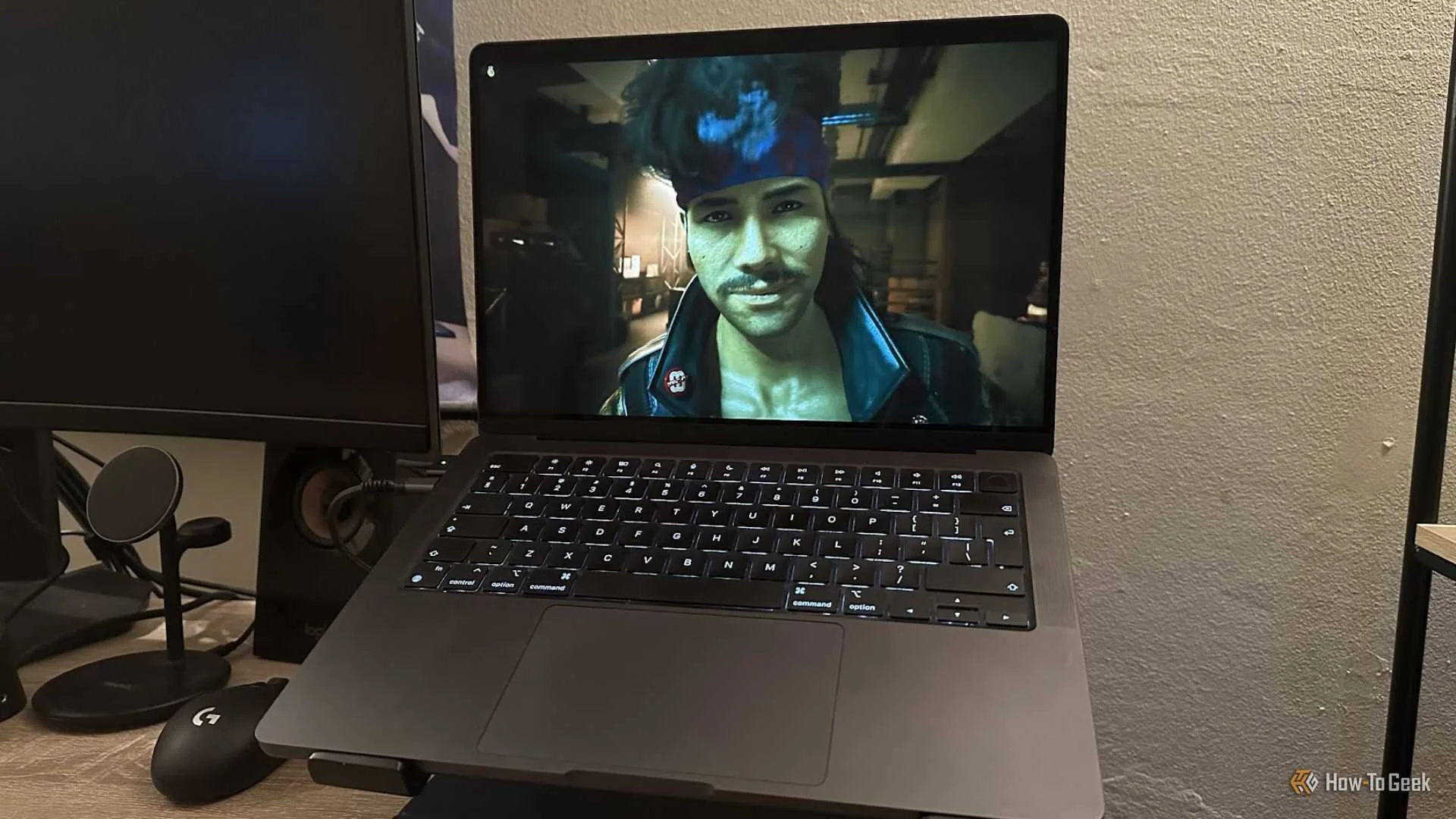 Cyberpunk 2077 running on a MacBook.