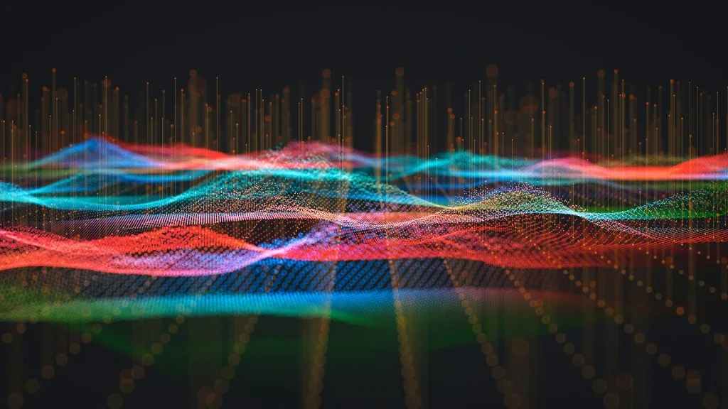 Abstract digital particle waves in red, blue, and teal with glowing vertical signal lines on a dark background, symbolizing concurrent data processing and backend system architecture.