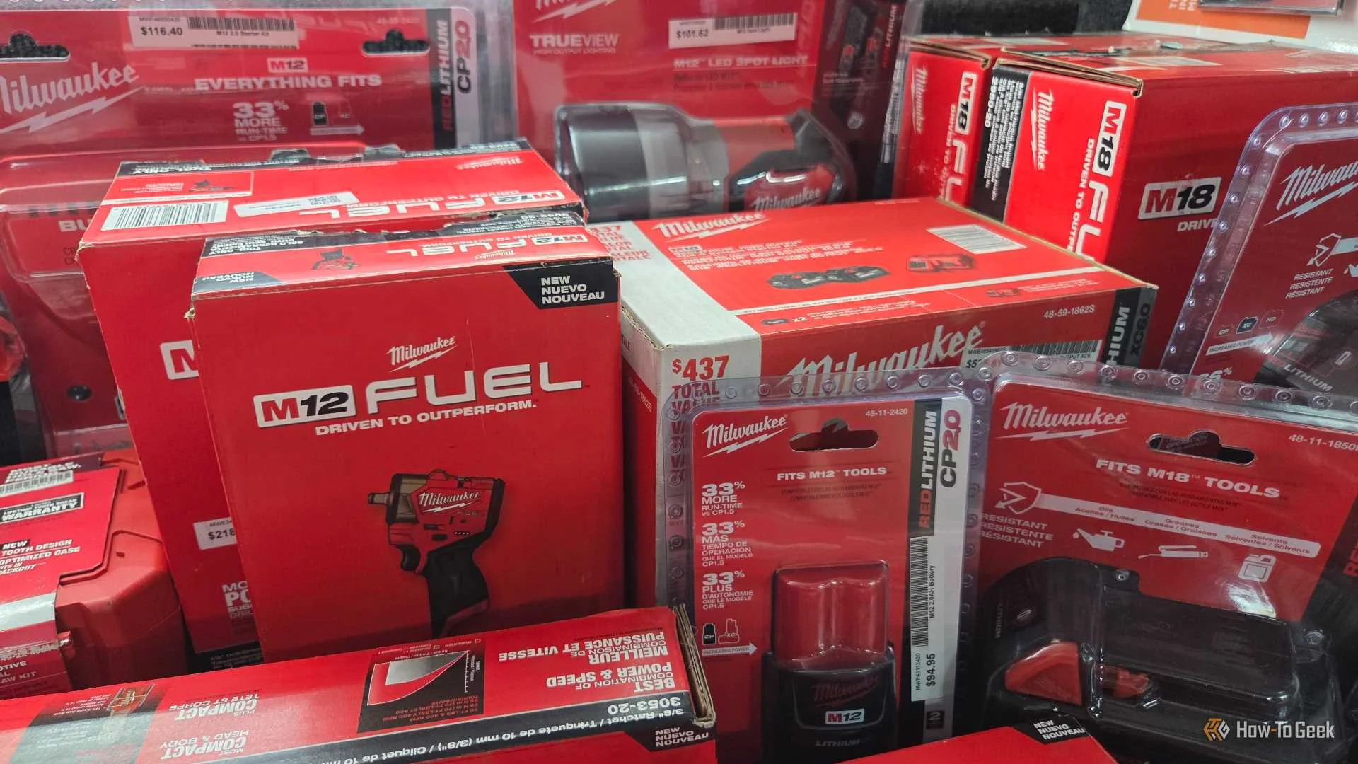Pile of Milwaukee tools and boxes