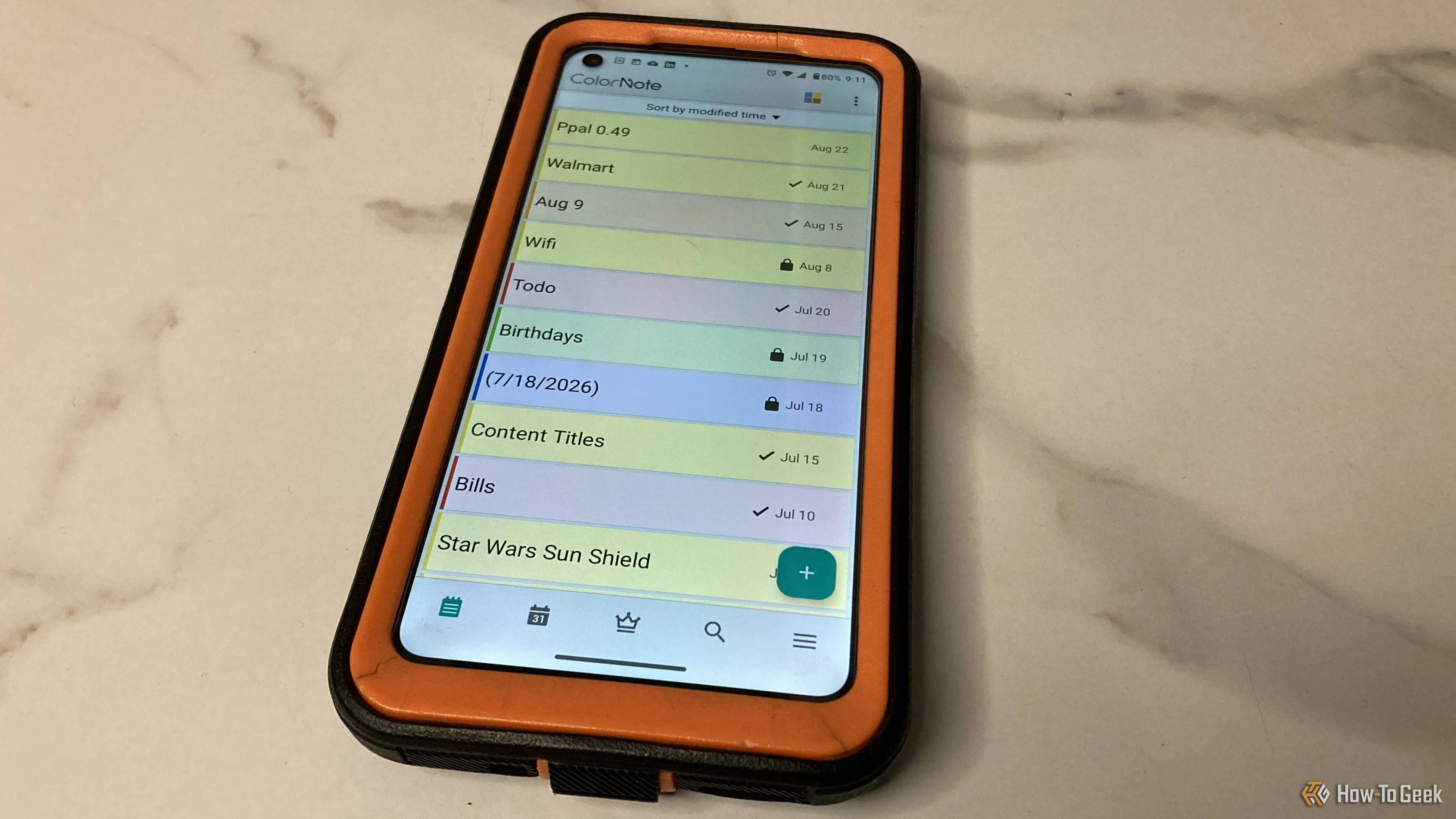Image of a Moto G Fast Android phone displaying ColorNote notes and checklists