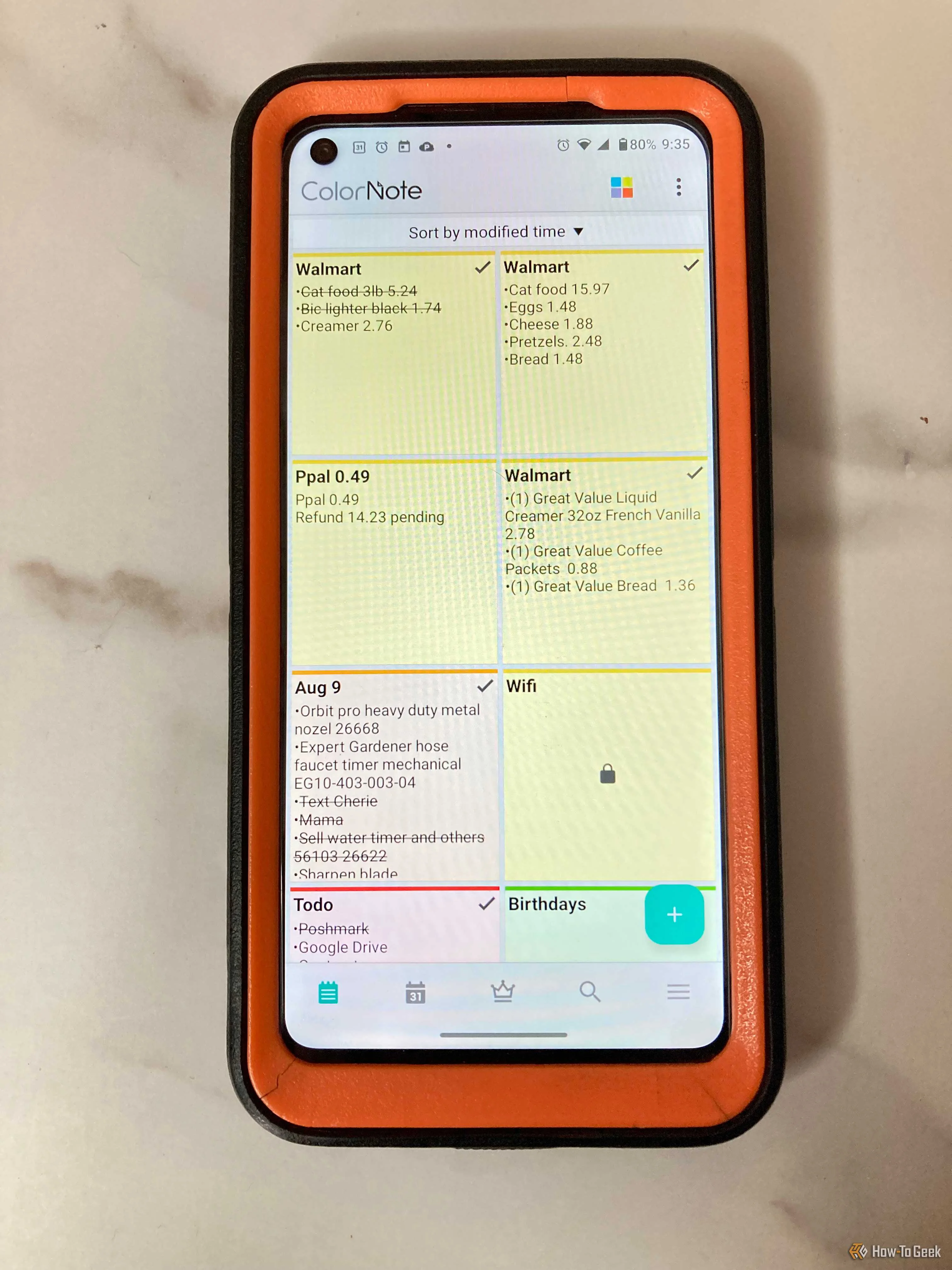 Android phone showing ColorNote notes in a large grid view