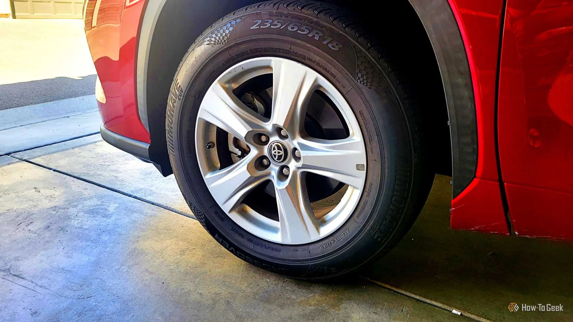 A car tire in a garage